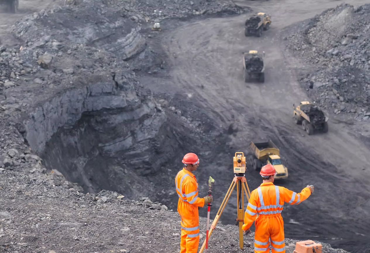 Survey crew at an open-pit mine